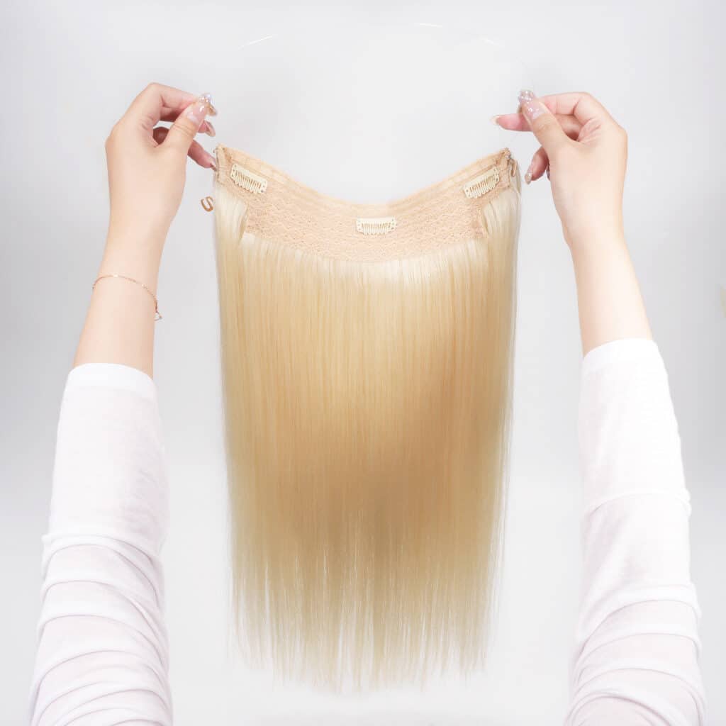 How much are hair extensions: a women is testing an adjustable halo hair extension